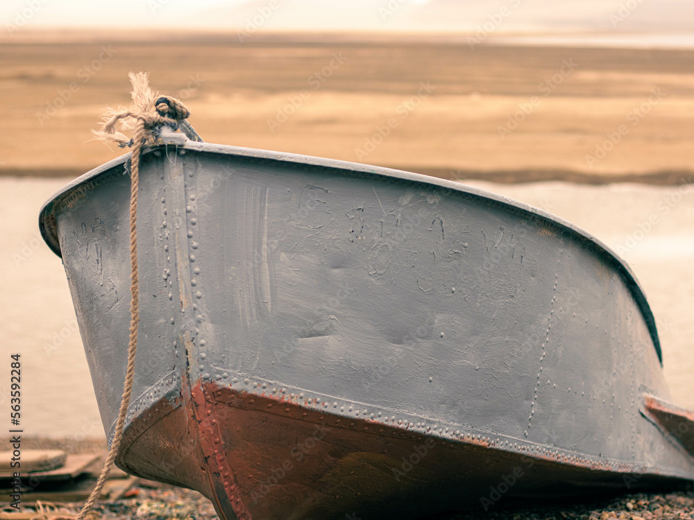 An old rusty boat on the beach An old rusty boat on the beach