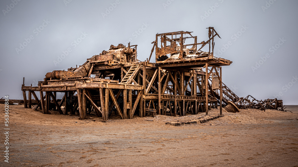 The rusted remains of an abandoned oil drilling rig between Henties Bay and Torra Bay, Skeleton Coast, Namibia.