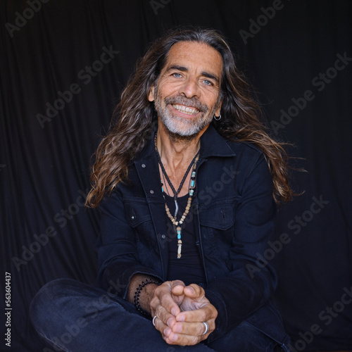 portrait of a man with long hair 