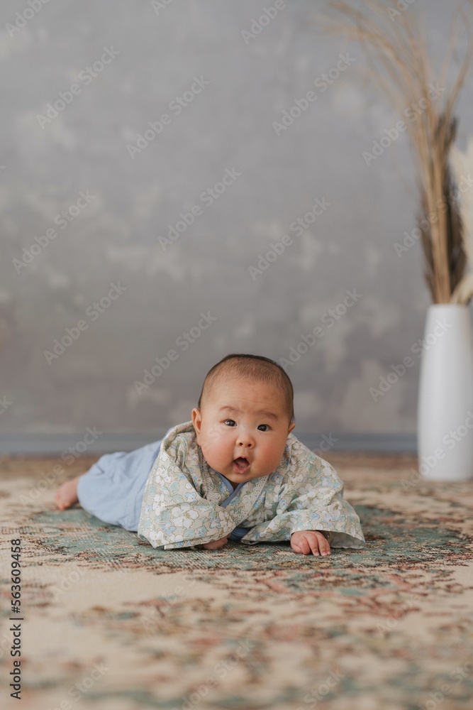 baby playing on the floor