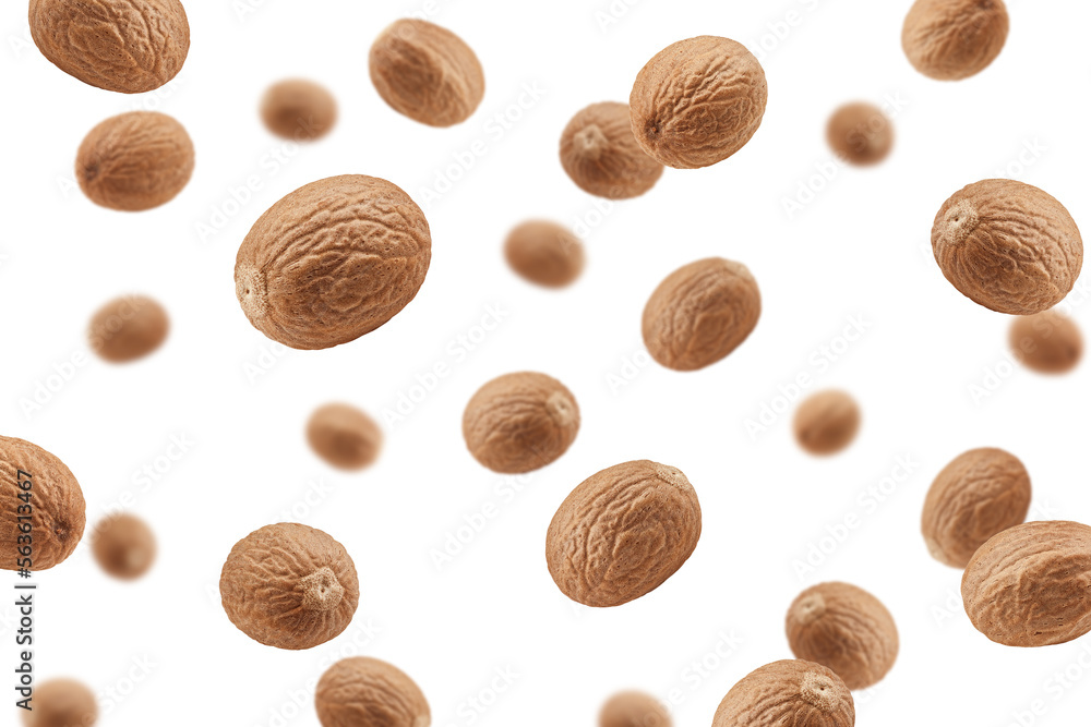 Falling Nutmeg isolated on white background, selective focus Falling Nutmeg isolated on white background, selective focus