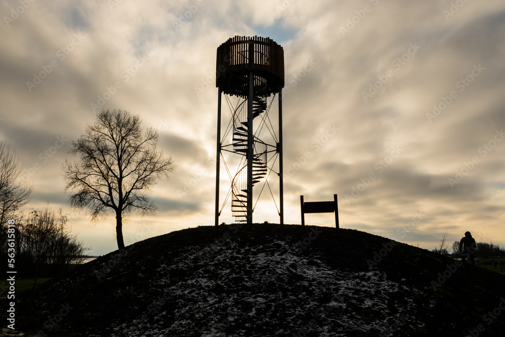 lookout observation watchtower in the the surf place lake in Reeuwijk Netherlands. Tall structure provides birds eye view of recreation lake and a perfect spot for watching ornithology lookout observation watchtower in the the surf place lake in Reeuwijk Netherlands. Tall structure provides birds eye view of recreation lake and a perfect spot for watching ornithology