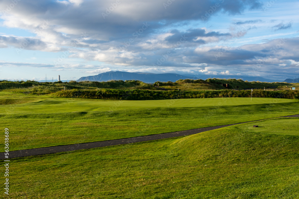 Golfcourse Seltjarnanes close to Reykjavik in Iceland and Grotta Island Lighthouse in the background