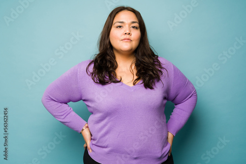 Obraz na plátně Somber fat woman looking at the camera