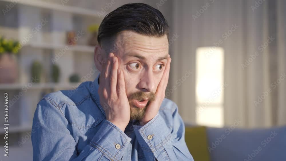 Depressed man is afraid and worried.
The man in the house looks around scared, worried and uneasy.
Depressed man is afraid and worried.
The man in the house looks around scared, worried and uneasy.