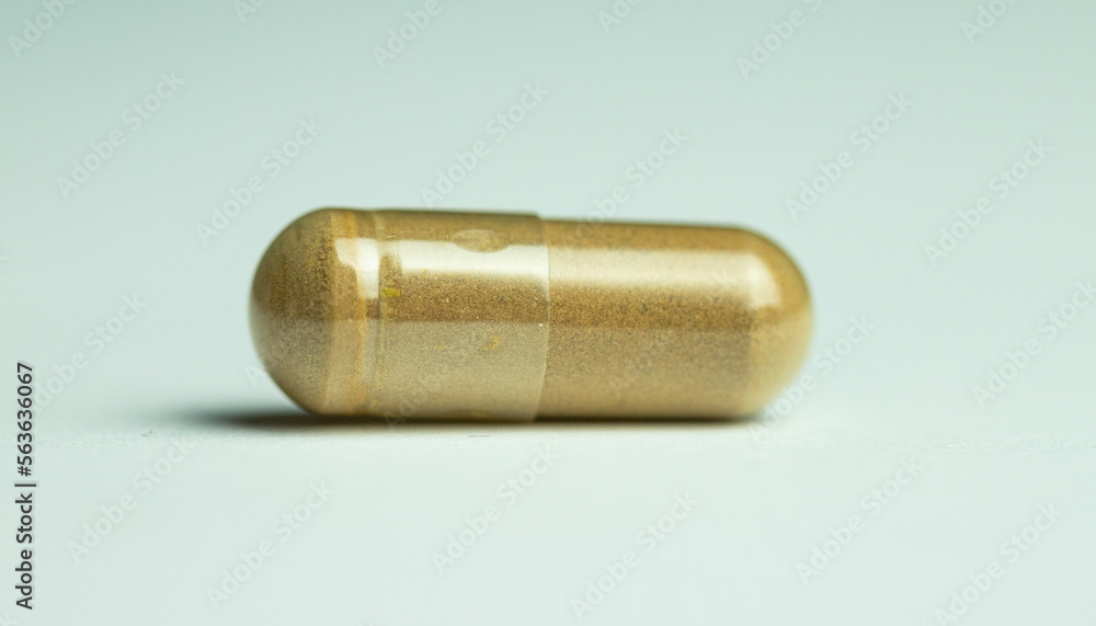 Ashwagandha capsule on white background, dietary supplement Ashwagandha capsule on white background, dietary supplement