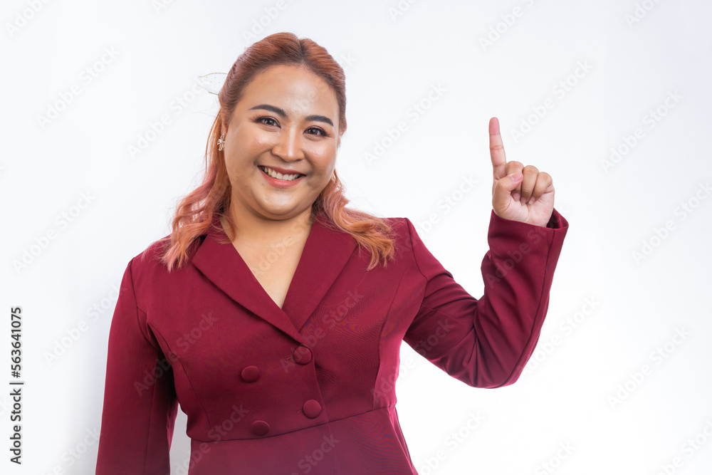 Pointing upper and side hand with finger. Plus size asian business woman show product on hand standing on white background. Looking at camera. Isolated on white. Pointing upper and side hand with finger. Plus size asian business woman show product on hand standing on white background. Looking at camera. Isolated on white.