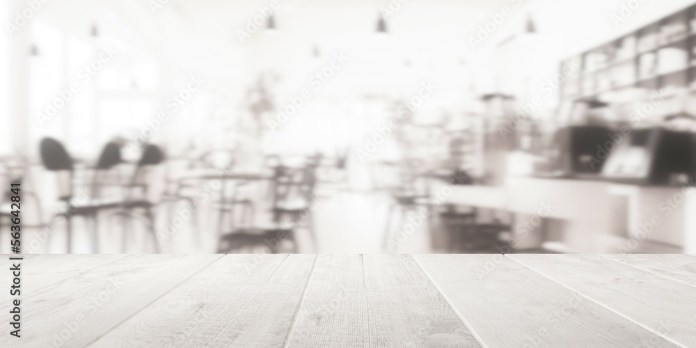 Empty wooden table top with out of focus lights bokeh modern white coffee shop background