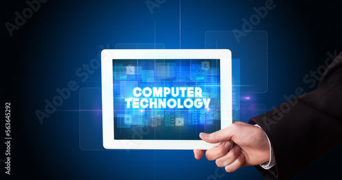 Wallpaper Mural Person holding tablet, technology concept Torontodigital.ca