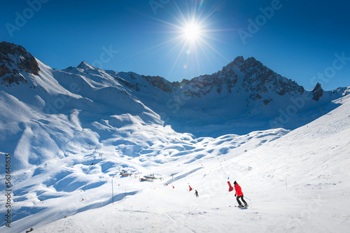 Ski resort in winter Alps mountains, France. View of ski slopes and ski lift. Meribel, France. © smallredgirl