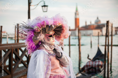 Beautiful colorful masks at traditional Venice Carnival in Venice, Italy