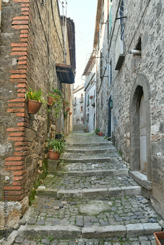Fototapeta Naklejka Na Ścianę i Meble -  A narrow street in the historic center of Patrica, an old village in Lazio in the province of Frosinone, Italy.
