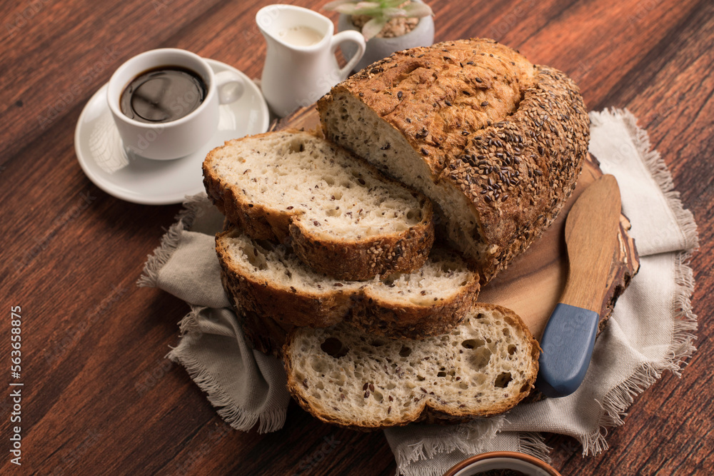 Freshly baked wheat bread loaf breakfast table Freshly baked wheat bread loaf breakfast table