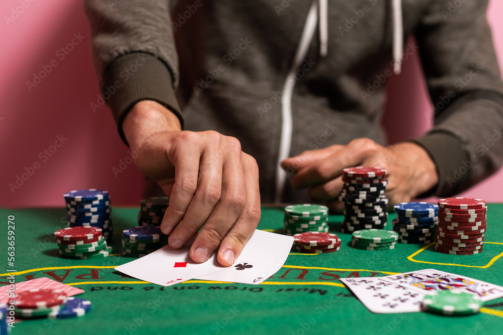 man playing blackjack at the table man playing blackjack at the table