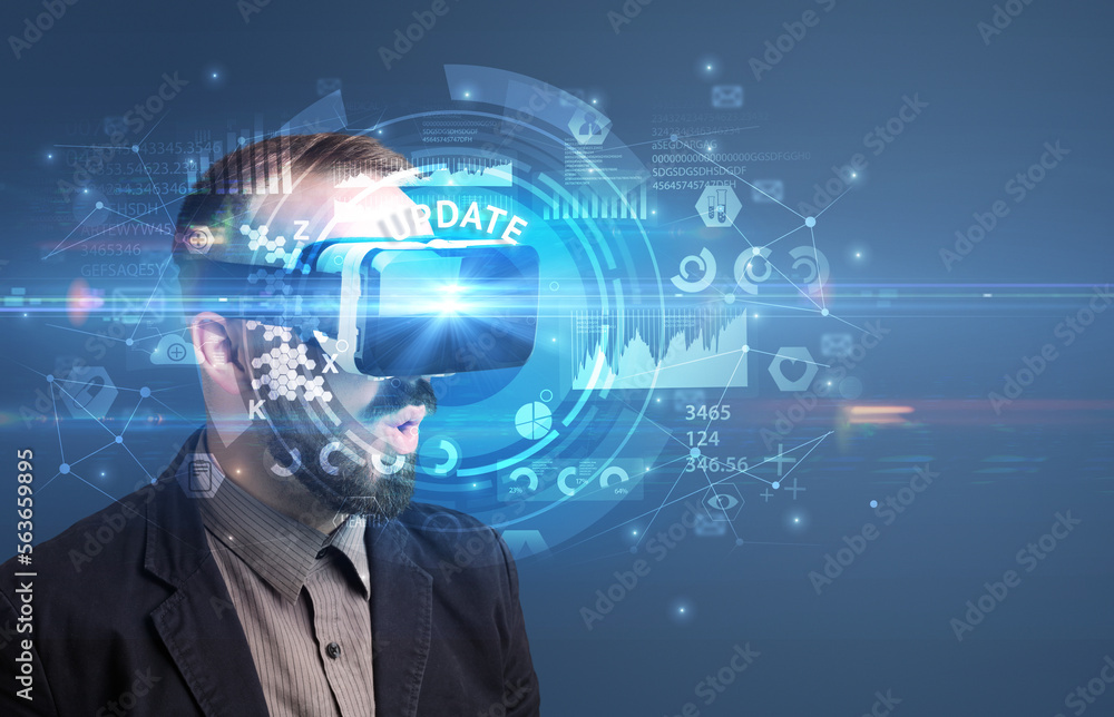 Businessman looking through VR glasses Businessman looking through VR glasses