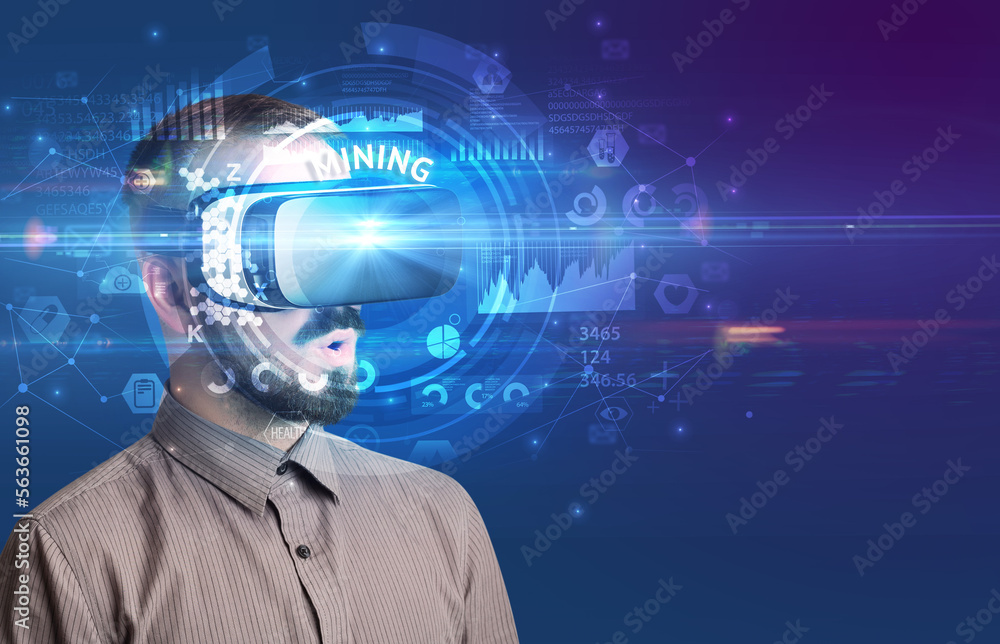 Businessman looking through VR glasses Businessman looking through VR glasses