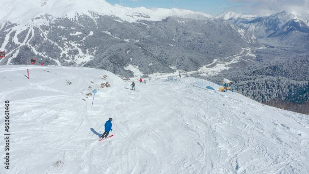 Aerial view of ski slope with ski riders Aerial view of ski slope with ski riders