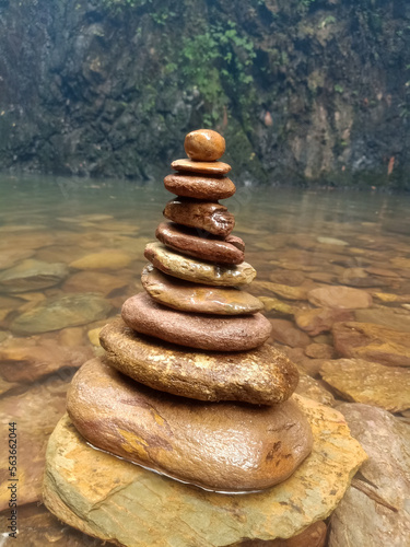 stack of stones near a NEHU Zomi falls
