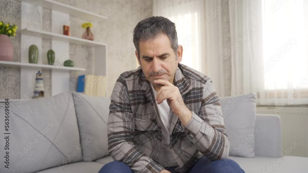 Close-up of lonely, thoughtful and unhappy man playing chess alone.
Mature man sitting on sofa at home playing chess thoughtfully alone.
Close-up of lonely, thoughtful and unhappy man playing chess alone.
Mature man sitting on sofa at home playing chess thoughtfully alone.