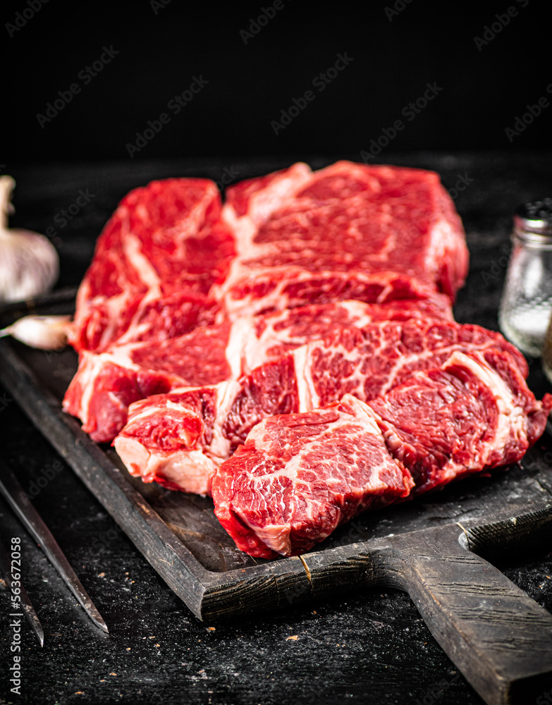 Raw beef on a cutting board. 