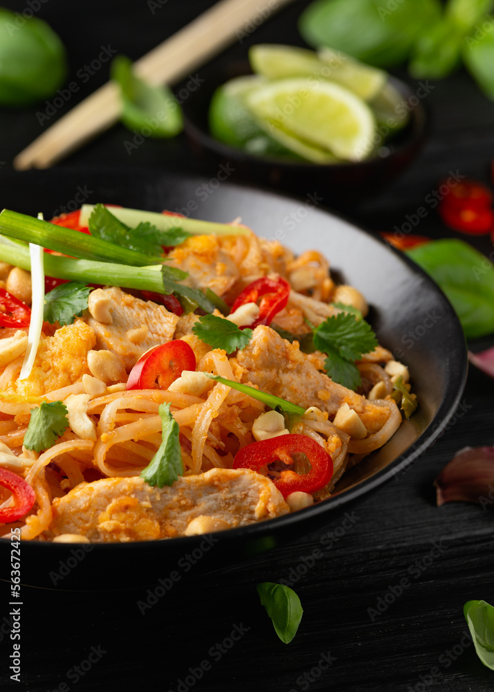 Chicken Pad Thai with eggs, bean sprouts, peanuts and spring onion Chicken Pad Thai with eggs, bean sprouts, peanuts and spring onion