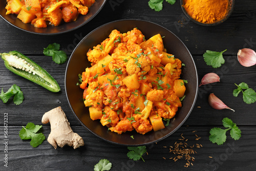 Aloo Gobi traditional Indian dish with cauliflower and potato photo