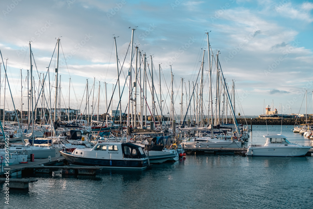 boats in the port with lighthouse at the end, Howth, Dublin, Ireland