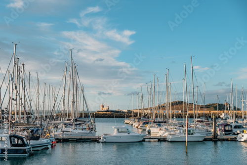boats in the port with lighthouse at the end, Howth, Dublin, Ireland