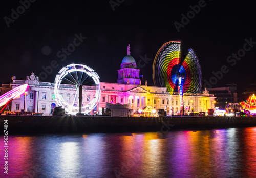 Long exposure night shots of Custom house quay in Dublin, theme park lights.