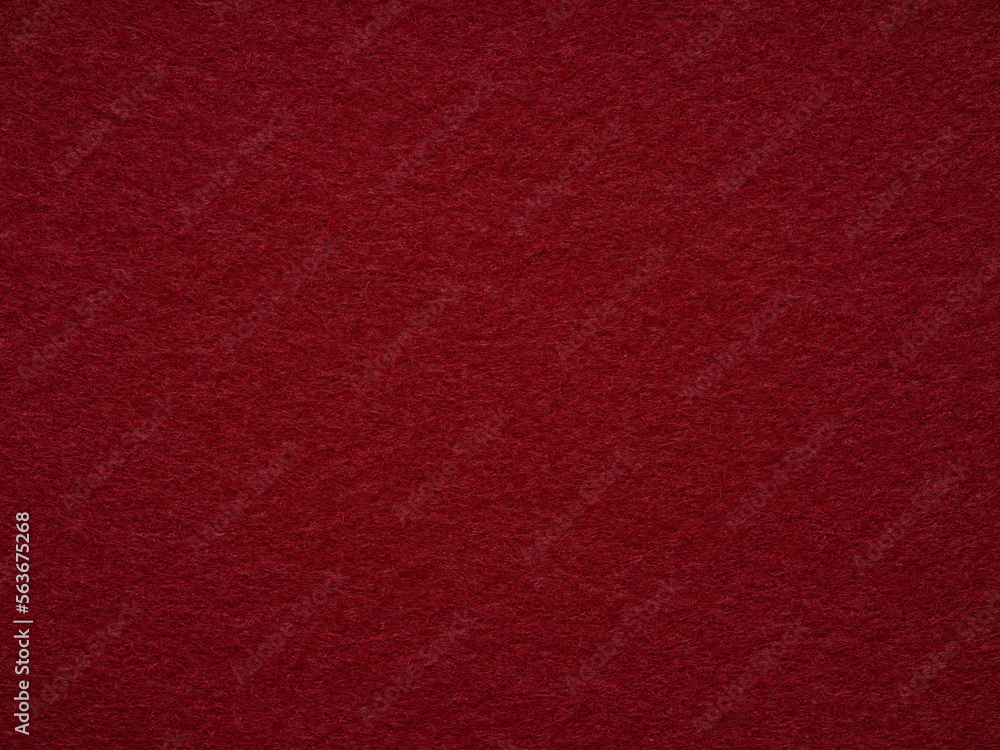Dark red blank felt texture closeup. Full frame retro, vintage pattern. Top view, layout, place for text. Textured wool pattern for shops with goods, creativity to illustrate patchwork master classes.