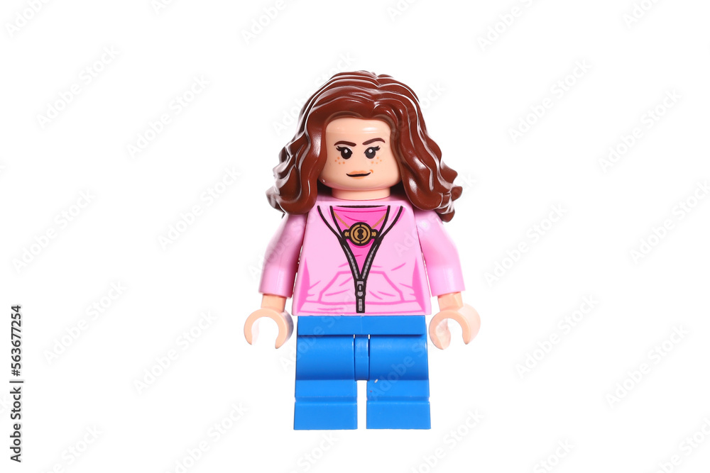 Naklejka premium Russia Vyborg 01.22.2023 Lego figure Hermione Granger in a pink sweater isolated on a white background.