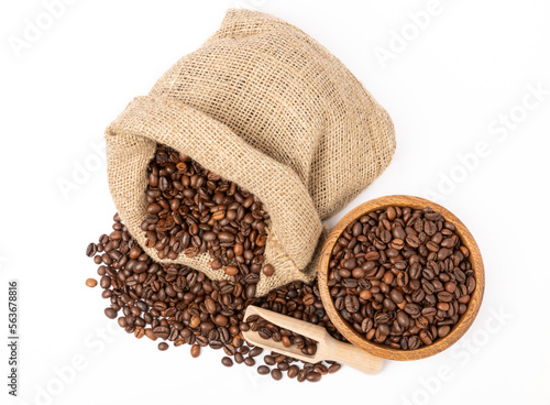 Coffee beans in bowl and burlap isolated on white background.