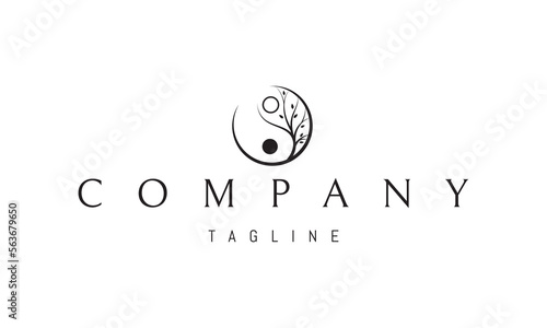 Vector logo on which an abstract image of the symbol of yin and yang in the form of a tree.
