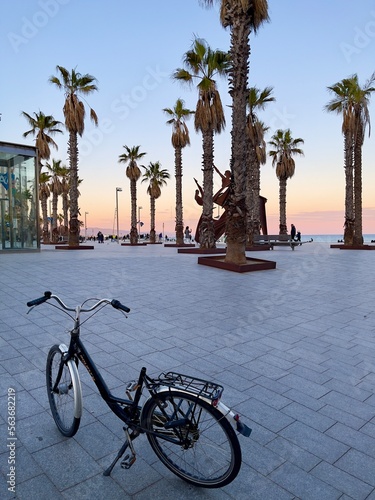 Bicycle on the edge of Barceloneta beach in Spain