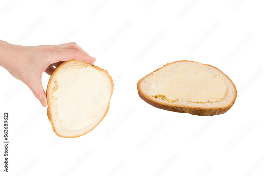 Bread and butter in woman hand isolated on white background. Bread and butter in woman hand isolated on white background.