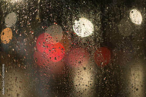 Wallpaper Mural Blurred multi-colored lights of cars and a night city through a glass splashed with rain 8 Torontodigital.ca