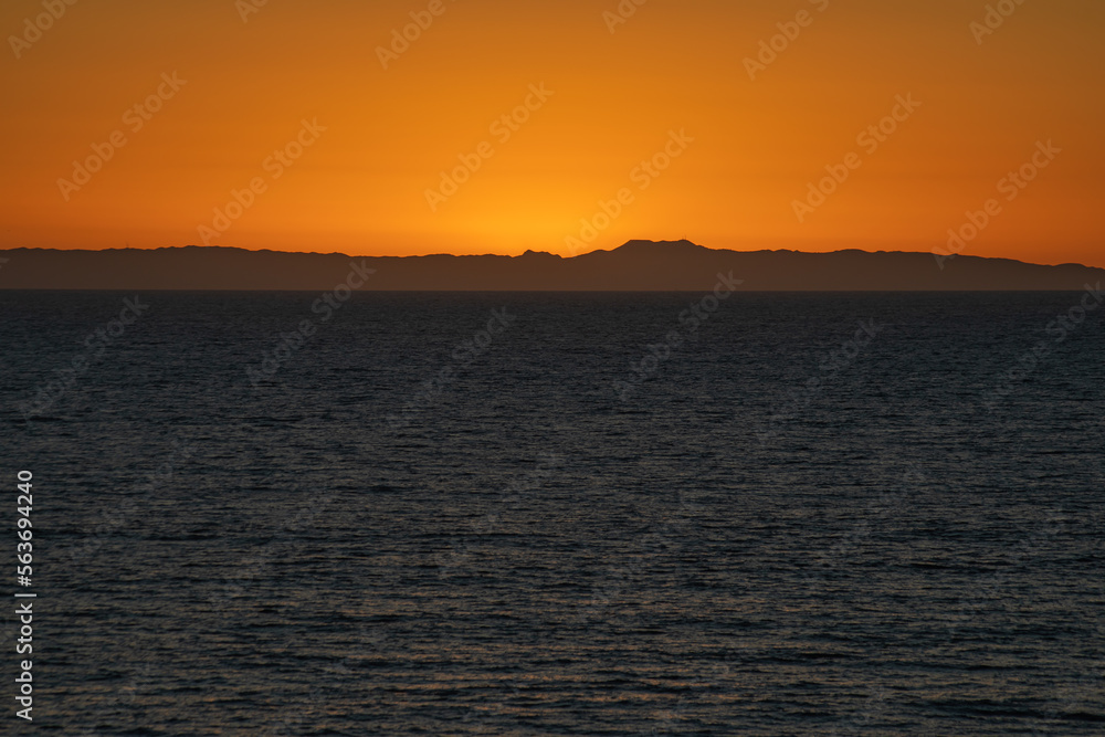 Sunset time view at Crystal Cove State Beach Shoreline with Ocean Waves, Newport Beach City, California