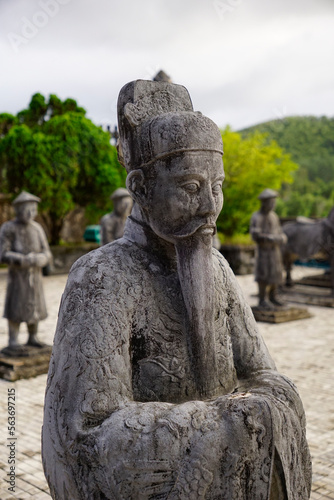 Stone figure of Mandarin or bureaucrat standing outside Khai Dinh Mausoleum in Hue, Vietnam                            © hippomyta