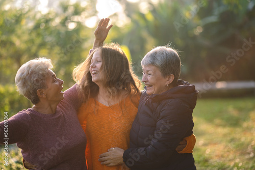 happiness female childhood family bonding mother lifestyle at nature outdoors  children daughter girl having affectionate embracing love with eltern woman  cheerful hug and smiling togetherness