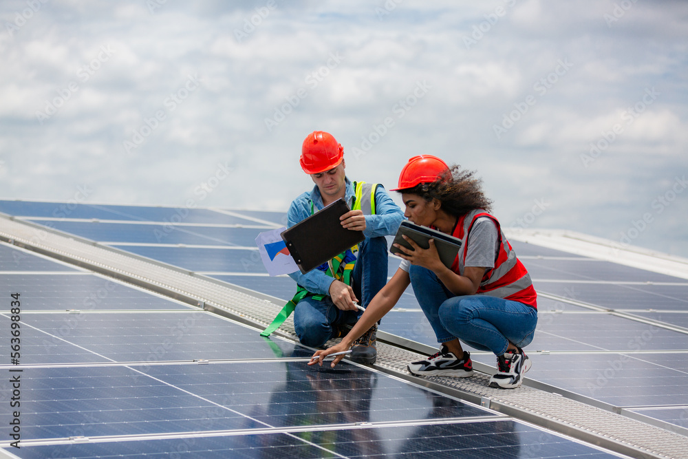 technician engineer working on sustainability environment resource concept, solar panel electricity roof technology for renewable energy power of sun, panel of solar cell industry, ecology system technician engineer working on sustainability environment resource concept, solar panel electricity roof technology for renewable energy power of sun, panel of solar cell industry, ecology system