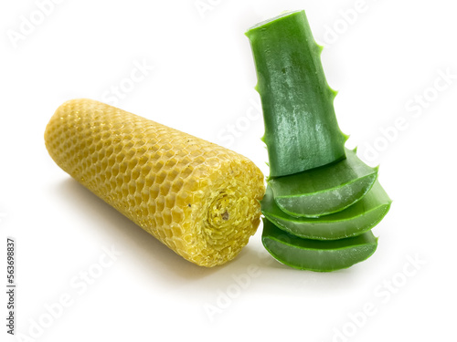 Aloe vera and wax isolated on white background. Composition of aloe vera and wax
