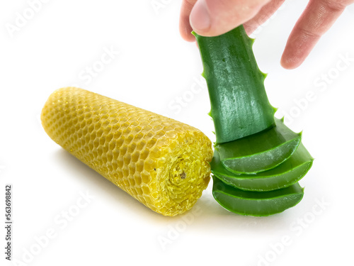 Aloe vera and wax isolated on white background. Composition of aloe vera and wax