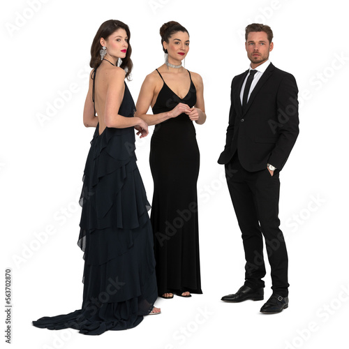 Foto Group of two women and a man dressed in black formal clothing attending an elega