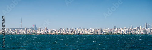 Panoramic view from the sea and waves to Istanbul in the Sea of Marmara summer sunny day. © Kufotos