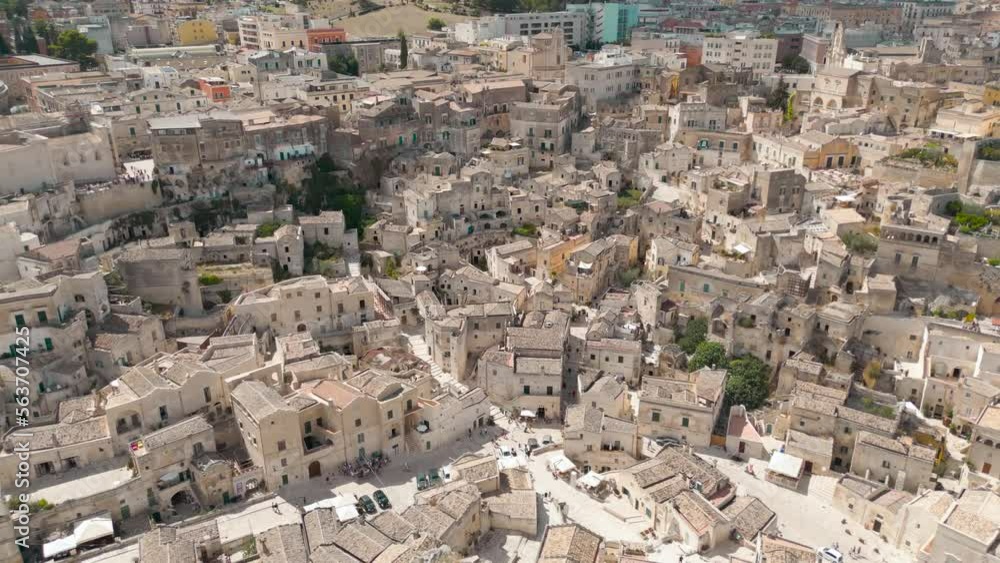 Sassi di Matera historical cityscape, drone flies over the old town
Sassi di Matera historical cityscape, drone flies over the old town