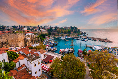Ships in the old harbour in Antalya (Kaleici), Turkey. Old town of Antalya is a popular Tourist destination in Turkey.