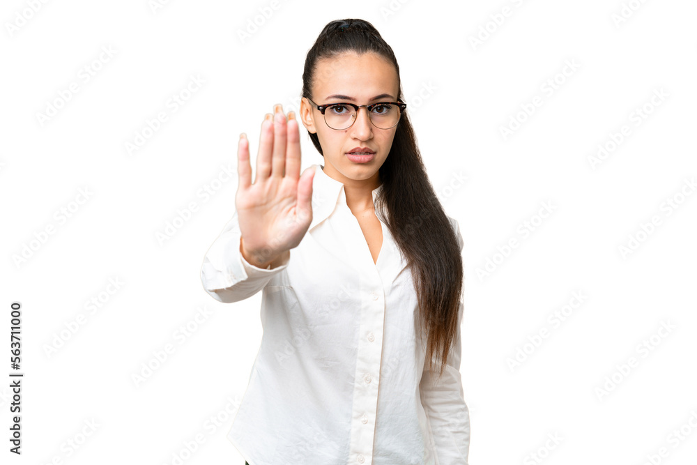 Young Arabian woman over isolated chroma key background making stop gesture Young Arabian woman over isolated chroma key background making stop gesture