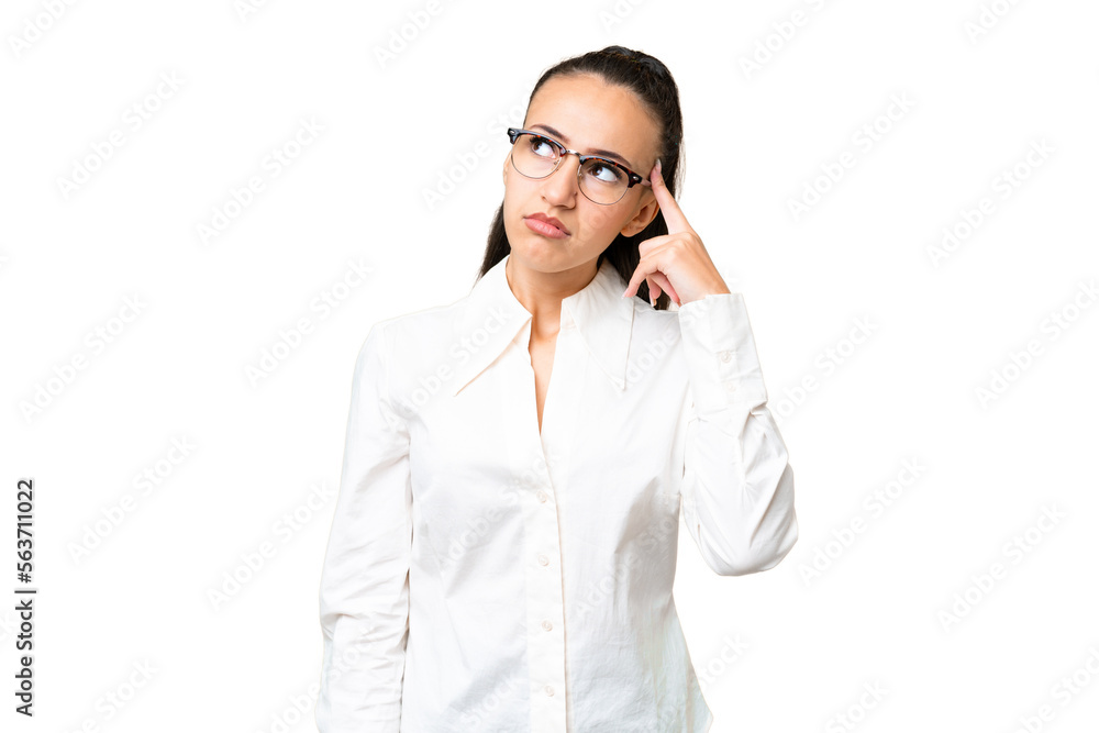 Young Arabian woman over isolated chroma key background making the gesture of madness putting finger on the head Young Arabian woman over isolated chroma key background making the gesture of madness putting finger on the head