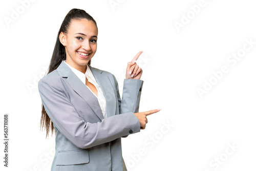 Принти на полотні Young Arabian woman over isolated chroma key background pointing finger to the s