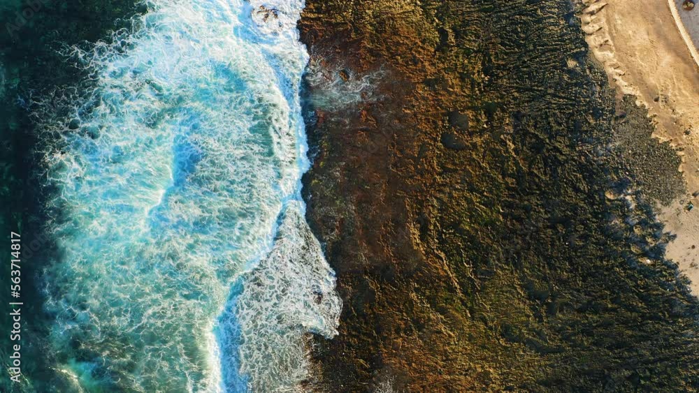 Ocean water waves foaming top down aerial static view. Tenerife Canary Islands. Ocean water waves foaming top down aerial static view. Tenerife Canary Islands.